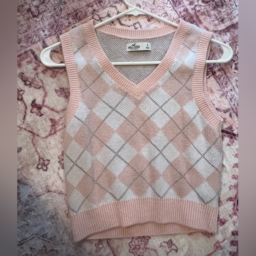 pink and white cropped sweater